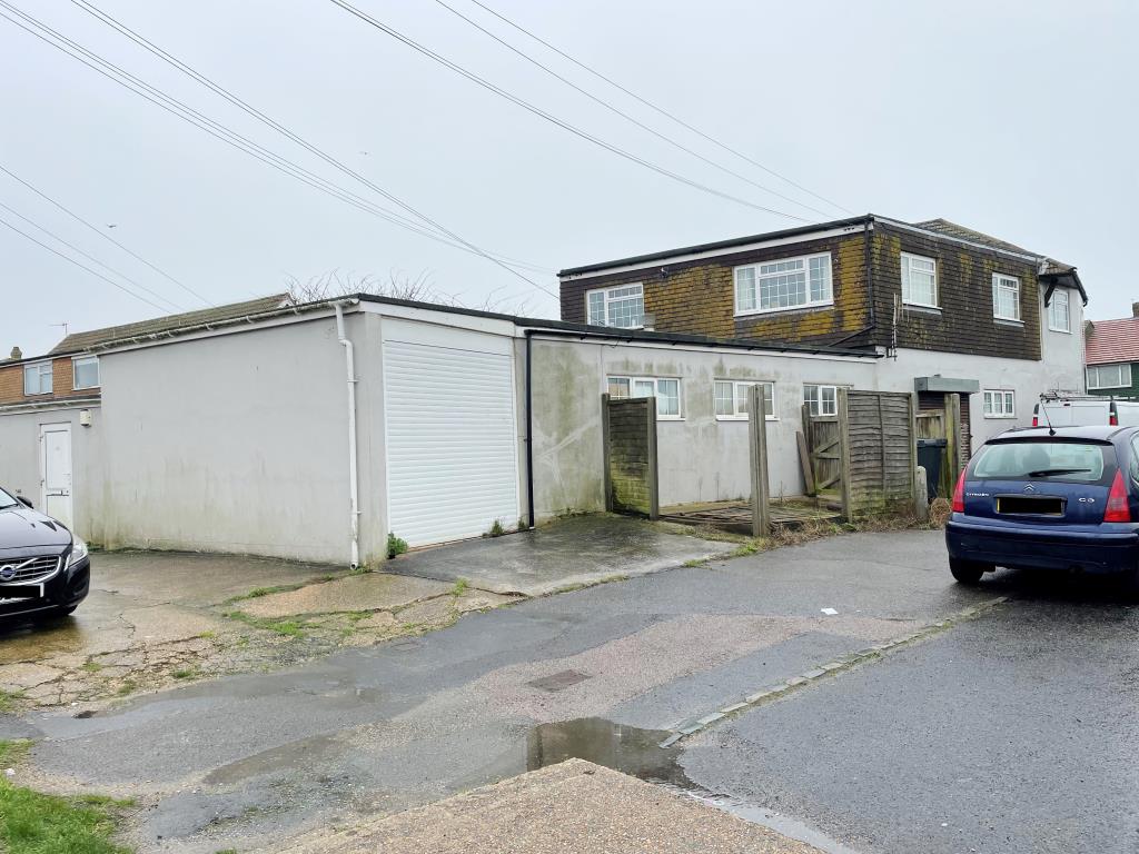 Lot: 85 - TWO FREEHOLD SHOPS PLUS WORKSHOP AND TWO FLATS ABOVE - Rear view of number 36